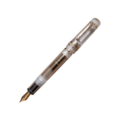 Delta Dolcevita IT Mid-Size Transparent Resin with Gold Trim Fountain Pen – 14Kt Fusion Stub Nib